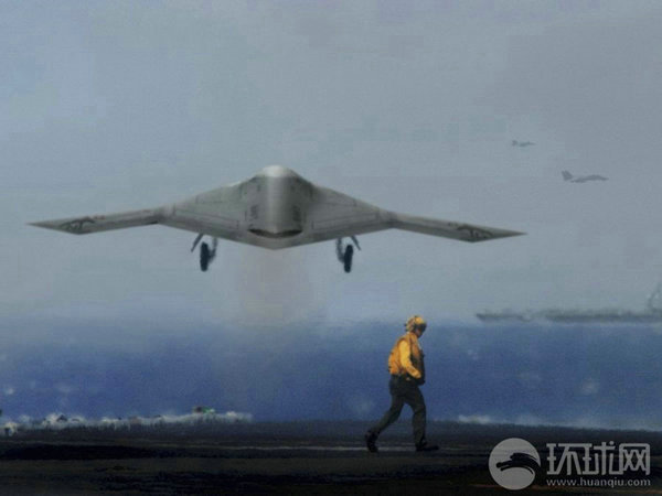 資料圖：X-47B無(wú)人機(jī)在航母上起降想象圖。